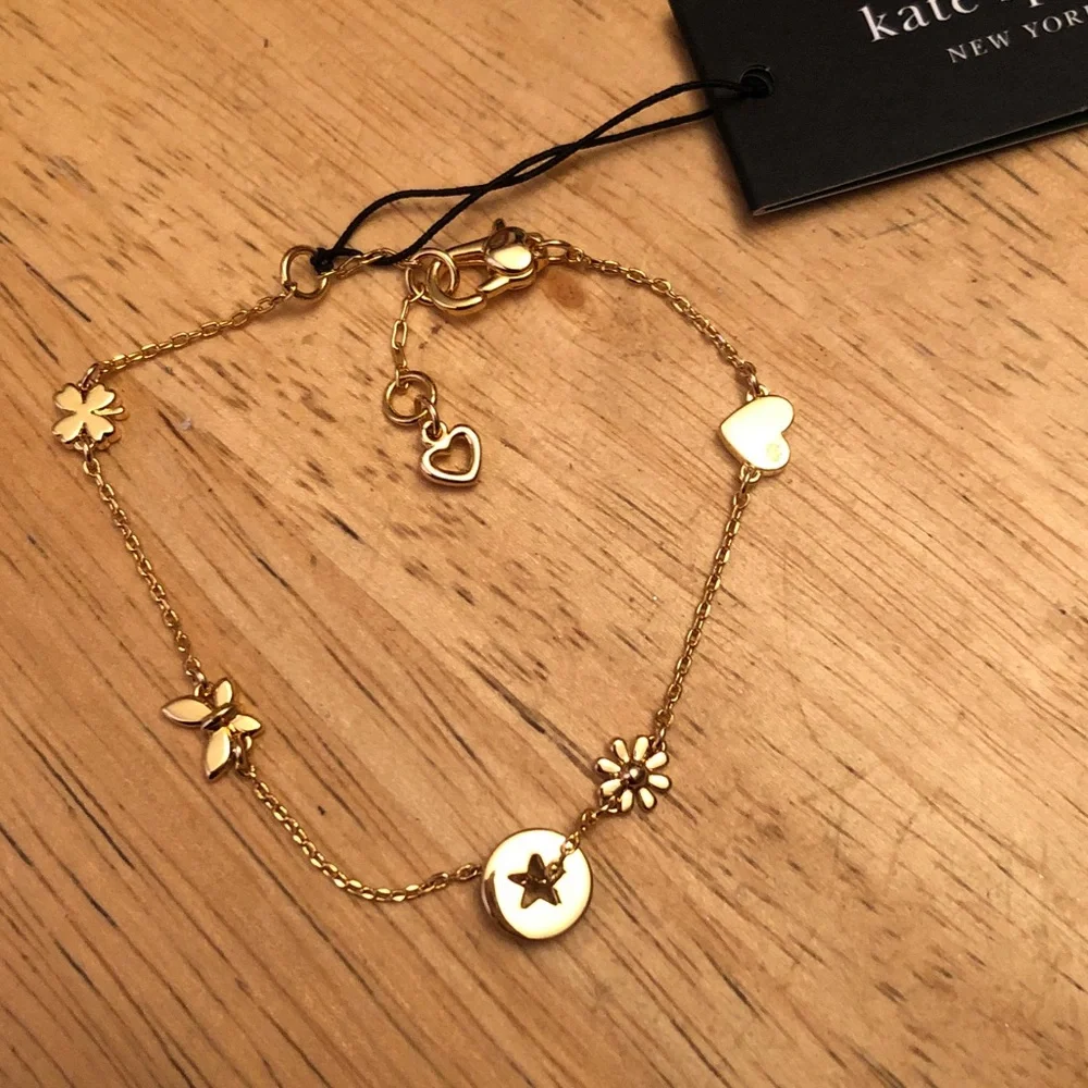 Kate Spade Gold Tone Rainbow Joy Charm Bracelet Heart, Flower, Clover NWT - Picture 11 of 12